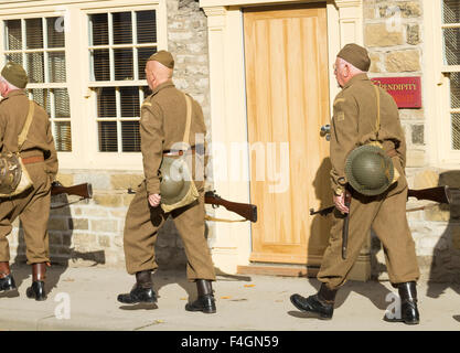 Pickering, North Yorkshire, UK. 17th October, 2015. Pickering`s annual Wartime and 40`s Weekend attracts thousands, with World War 2 living history camps and battle re-enactments amomg the attractions. PICTURED: Home Guard marching through the town Stock Photo